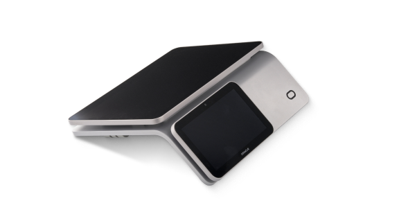A modern, sleek electronic device with a touchscreen interface, angled and resting on a flat surface, partially open.