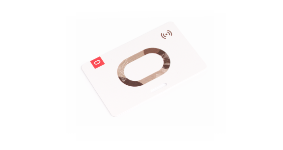A white NFC card with a red square in the top left corner and a wireless signal icon in the top right corner.
