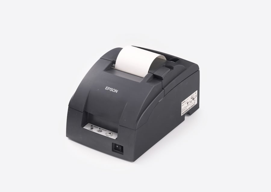 A compact Epson receipt printer with a roll of paper loaded at the top, designed for point-of-sale use.