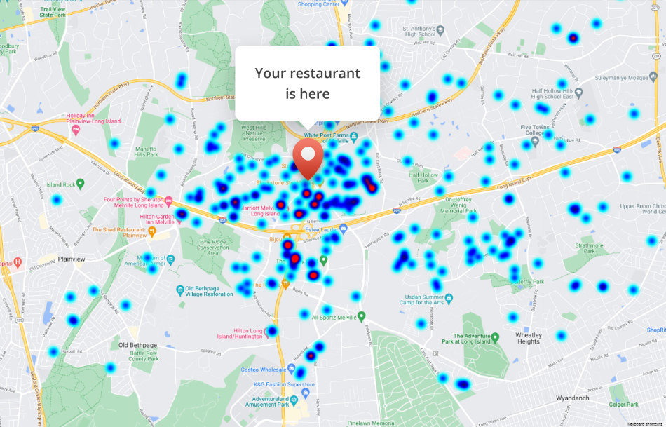 A map with various blue heat spots indicating high activity areas. A red marker is labeled "Your restaurant is here," pinpointing the location of a restaurant in the center of the map. A map with various blue heat spots indicating high activity areas. A red marker is labeled "Your restaurant is here," pinpointing the location of a restaurant in the center of the map.